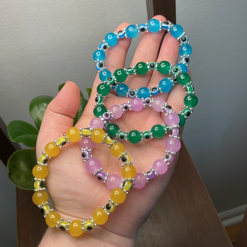 4pc LOT *NWOT* Stretchy evil eye bracelets >> blue/green/pink/yellow & silver
